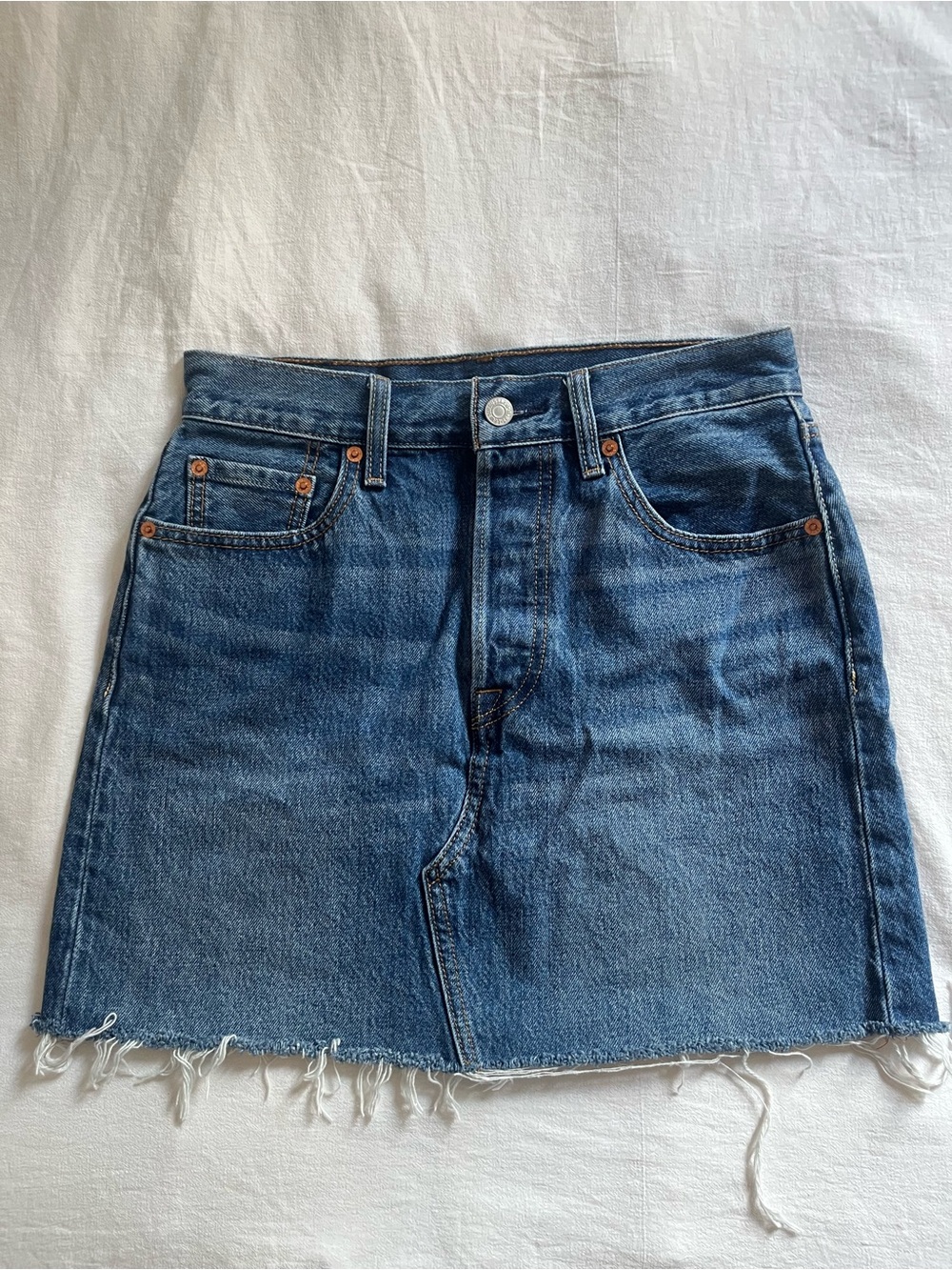 Levi's high-rise raw-edge Denim Mini Skirt